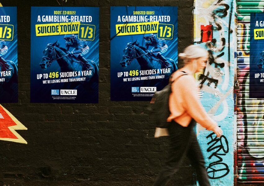 A poster on a wall shows the impact gambling has on suicide rates